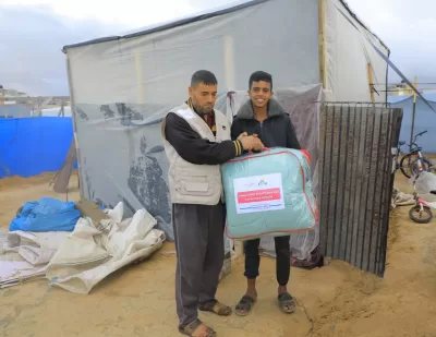 A winter package delivered to a tent shelter